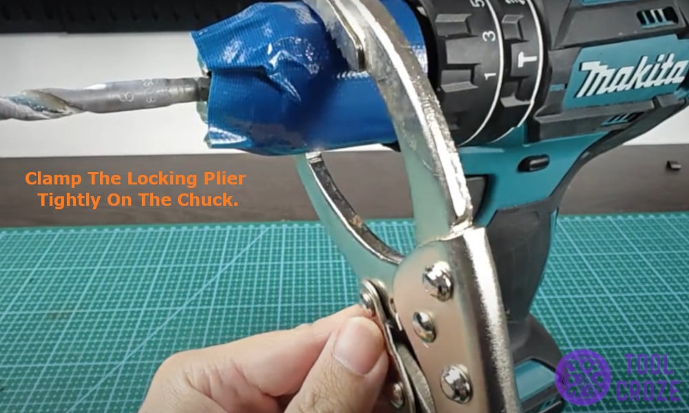 clamp the locking plier tightly on the chuck