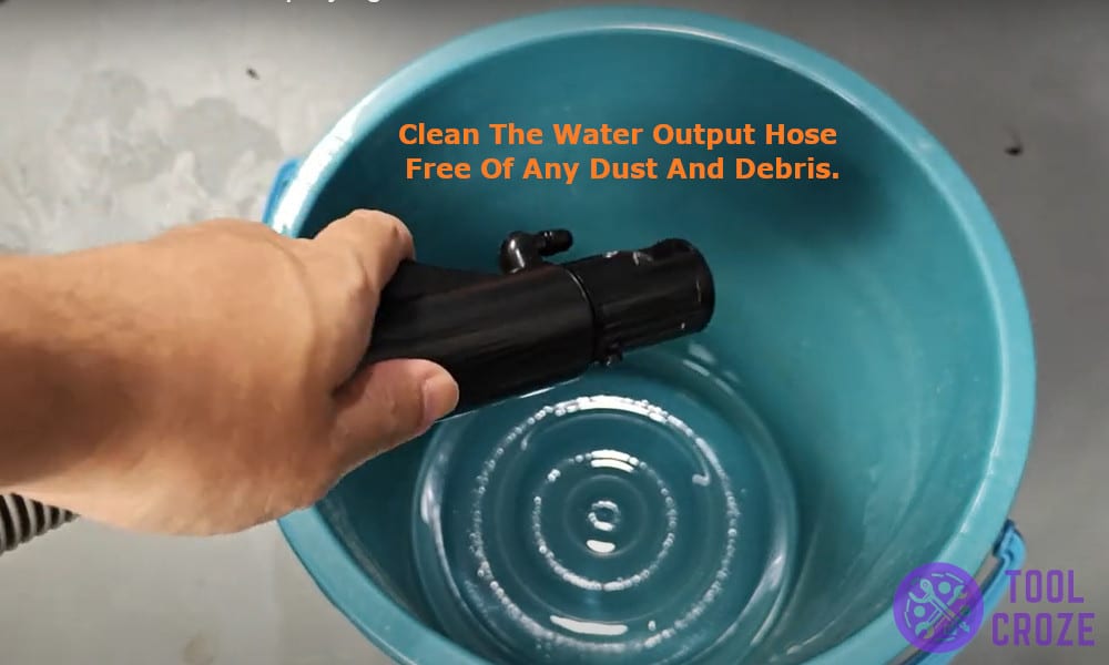 clean the water output hose free of any dust and debris.