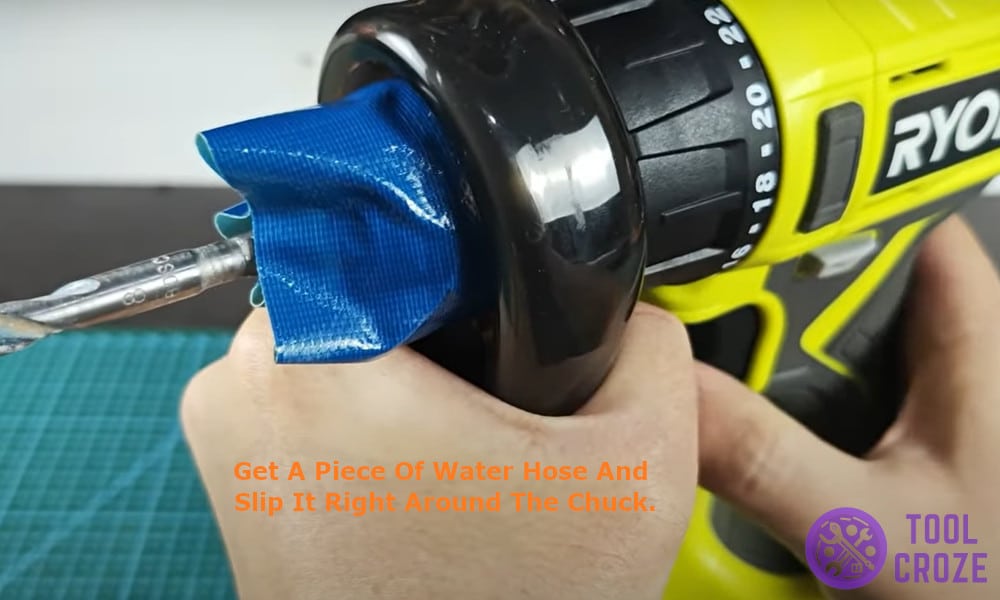 get a piece of water hose and slip it right around the chuck