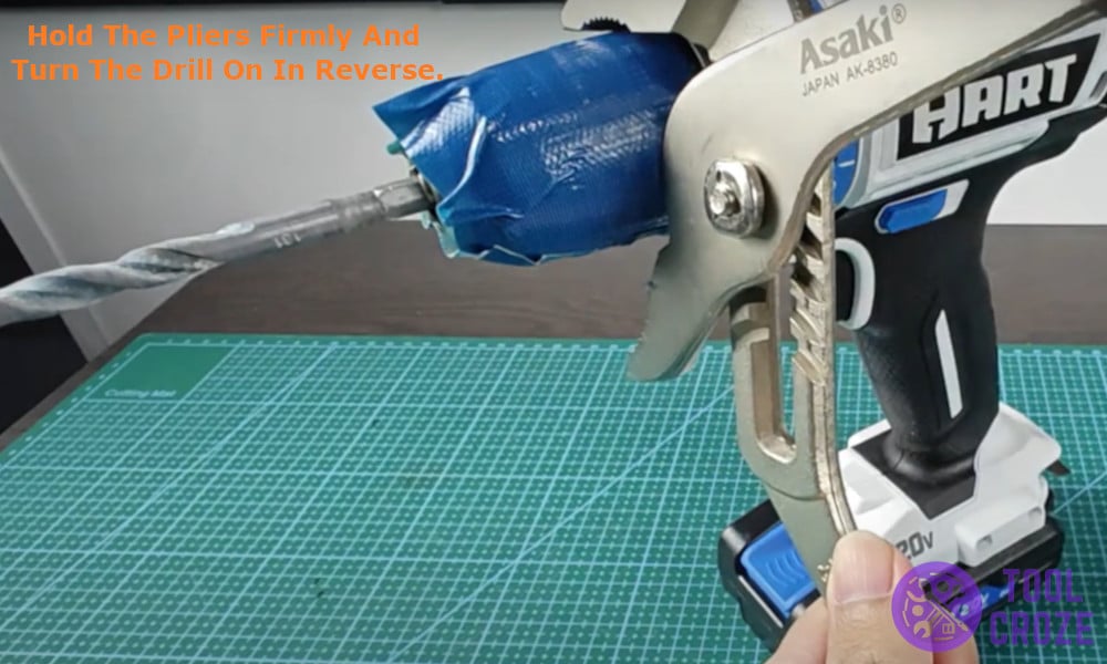 held the pliers firmly and turned the drill on