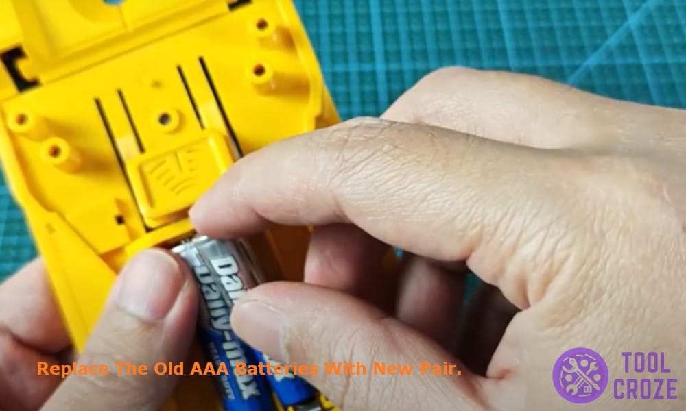 replace the old AAA batteries with new pair