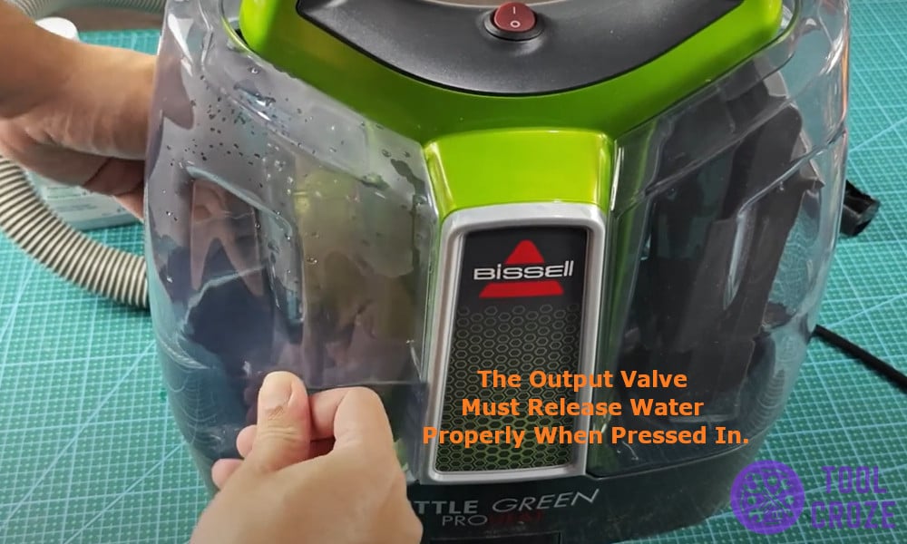 the output valve must release water properly when pressed in.