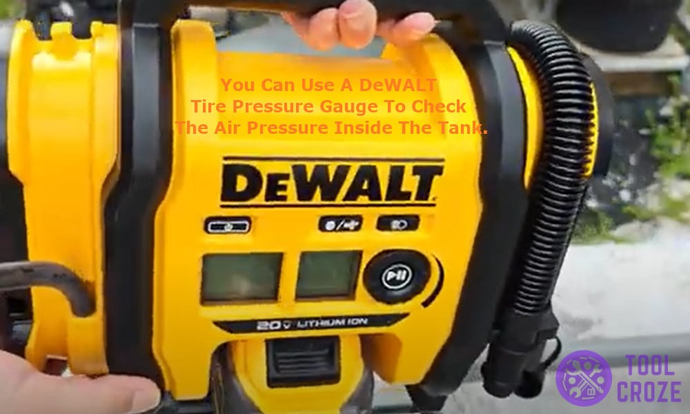 the tire pressure gauge to check the air pressure inside the tank.