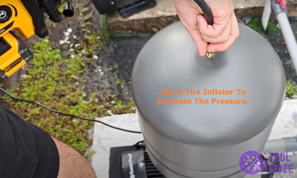 use a tire inflator to increase pressure