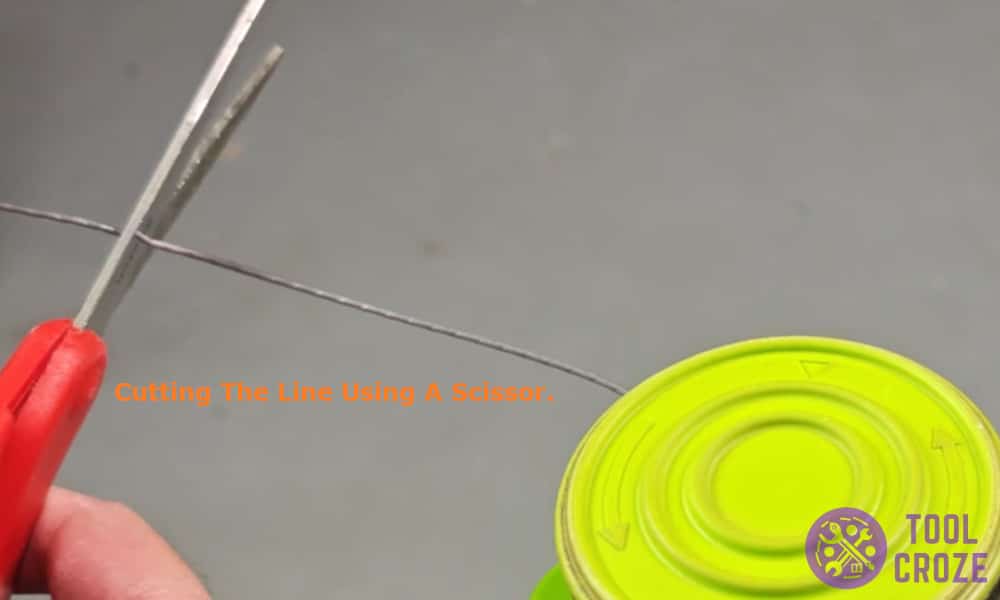 Cutting the line using a scissor