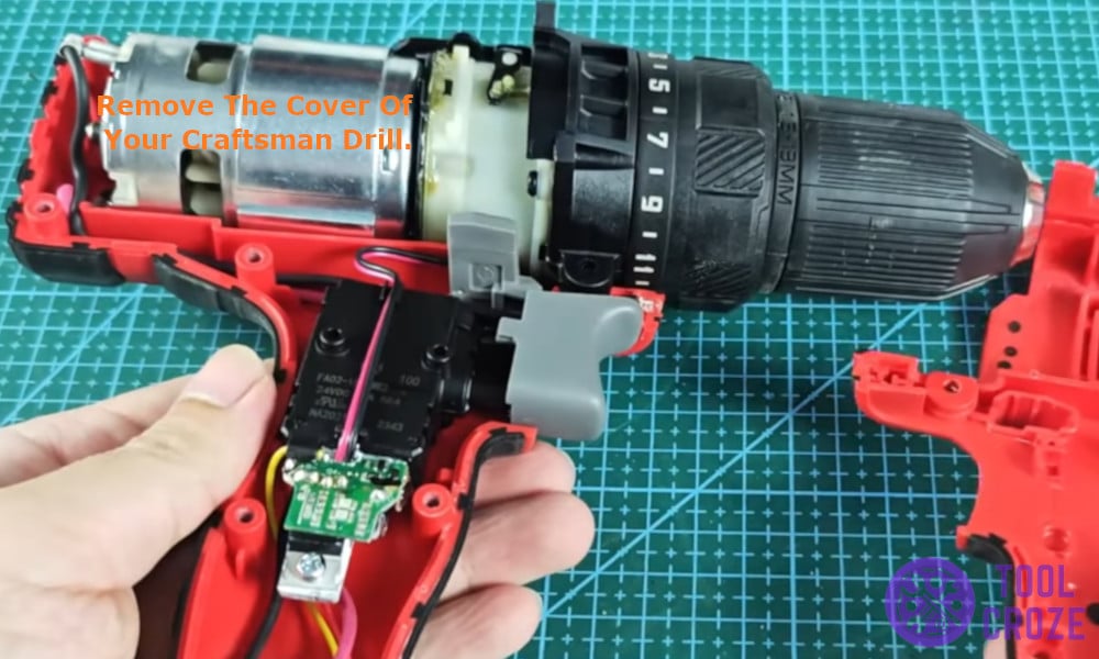 Remove the cover of the craftsman drill