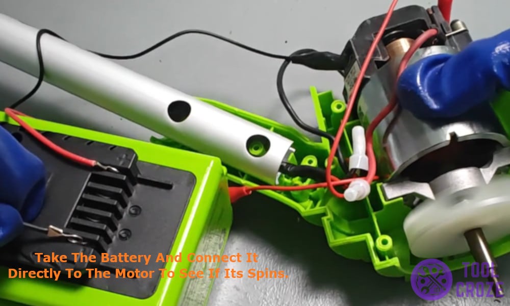 Take the Greenworks battery and connect it directly to the motor to see if its spins.