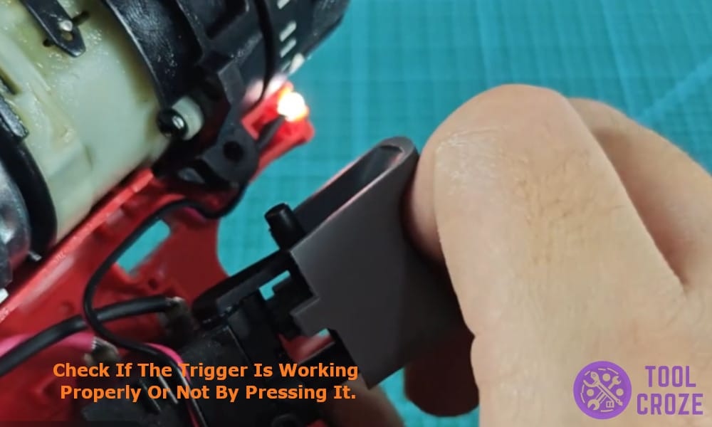check if the trigger is working properly or not by pressing it