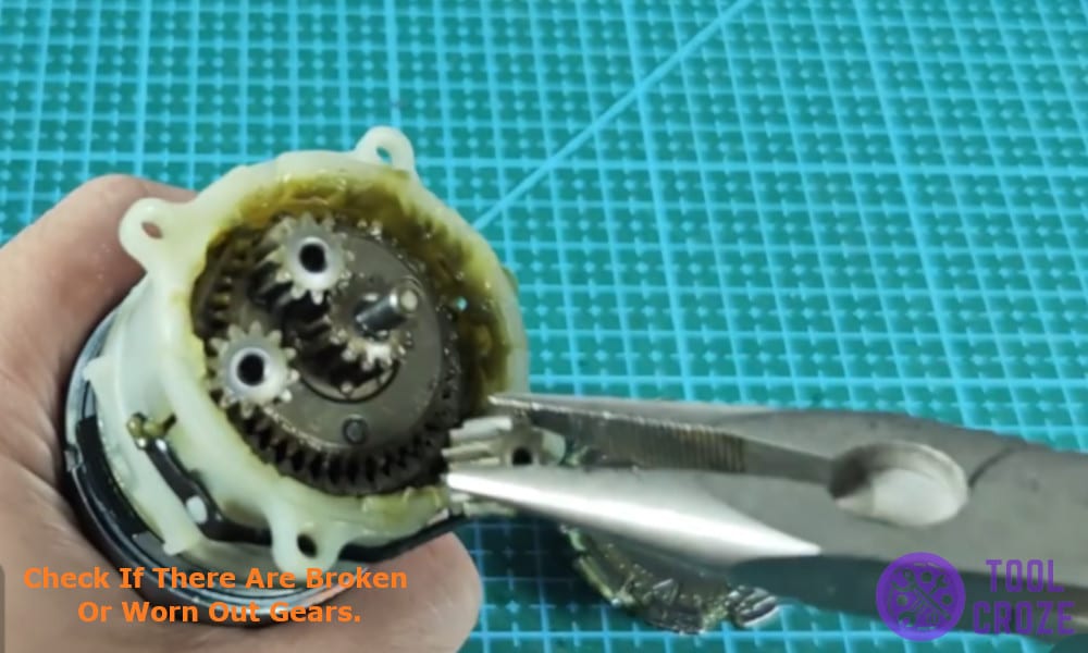 check if there are broken or worn out gears.