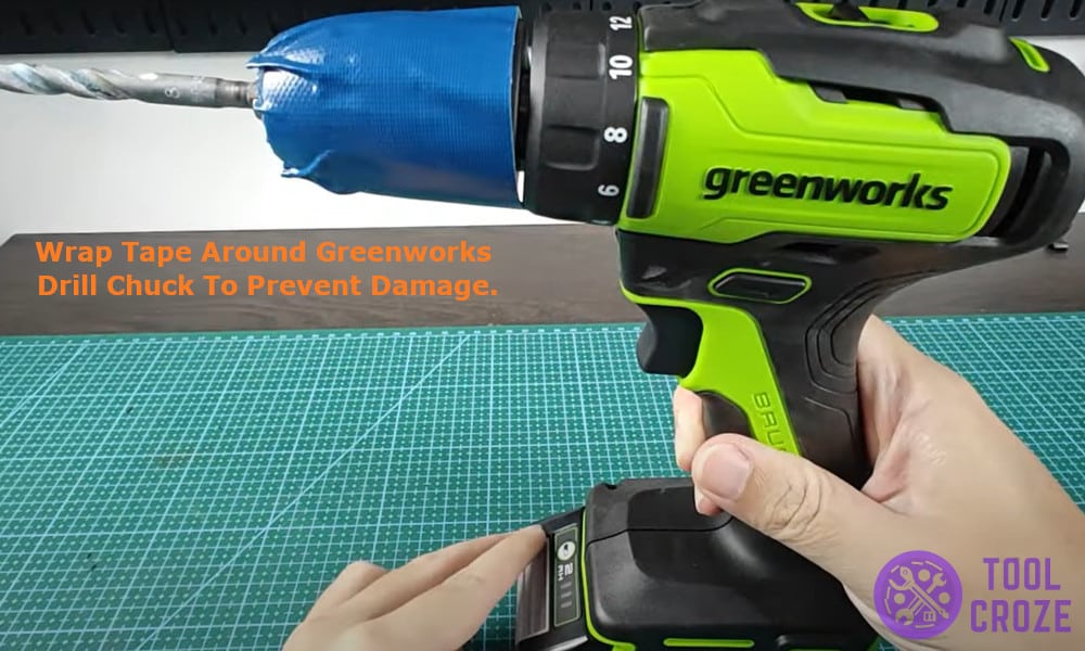 wrap tape around Greenworks drill chuck to prevent damage