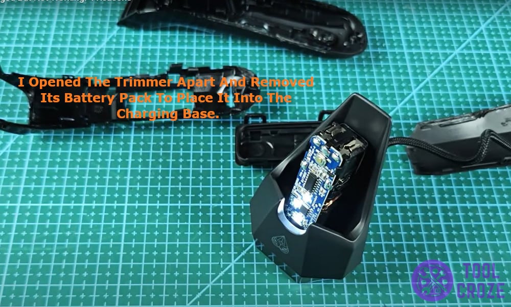 I opened the trimmer apart and removed it battery pack to place it into the charging base