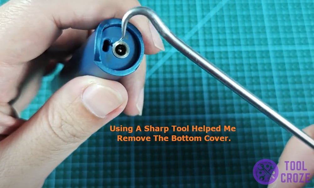 Using a sharp tool helped me remove the bottom cover