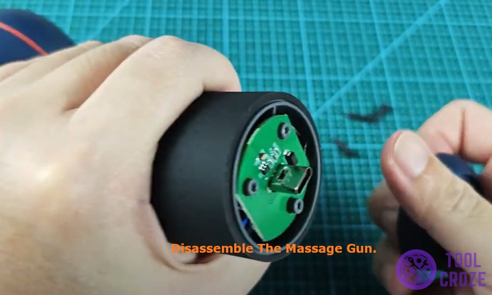 disassemble the massage gun