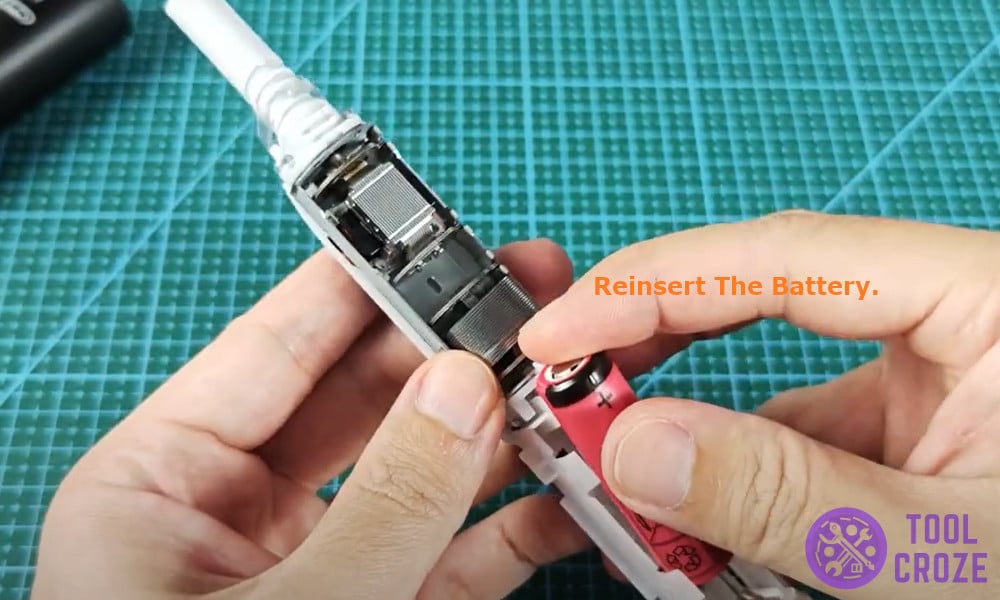 reinsert the battery