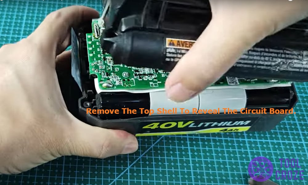 remove the top shell to reveal the circuit board.