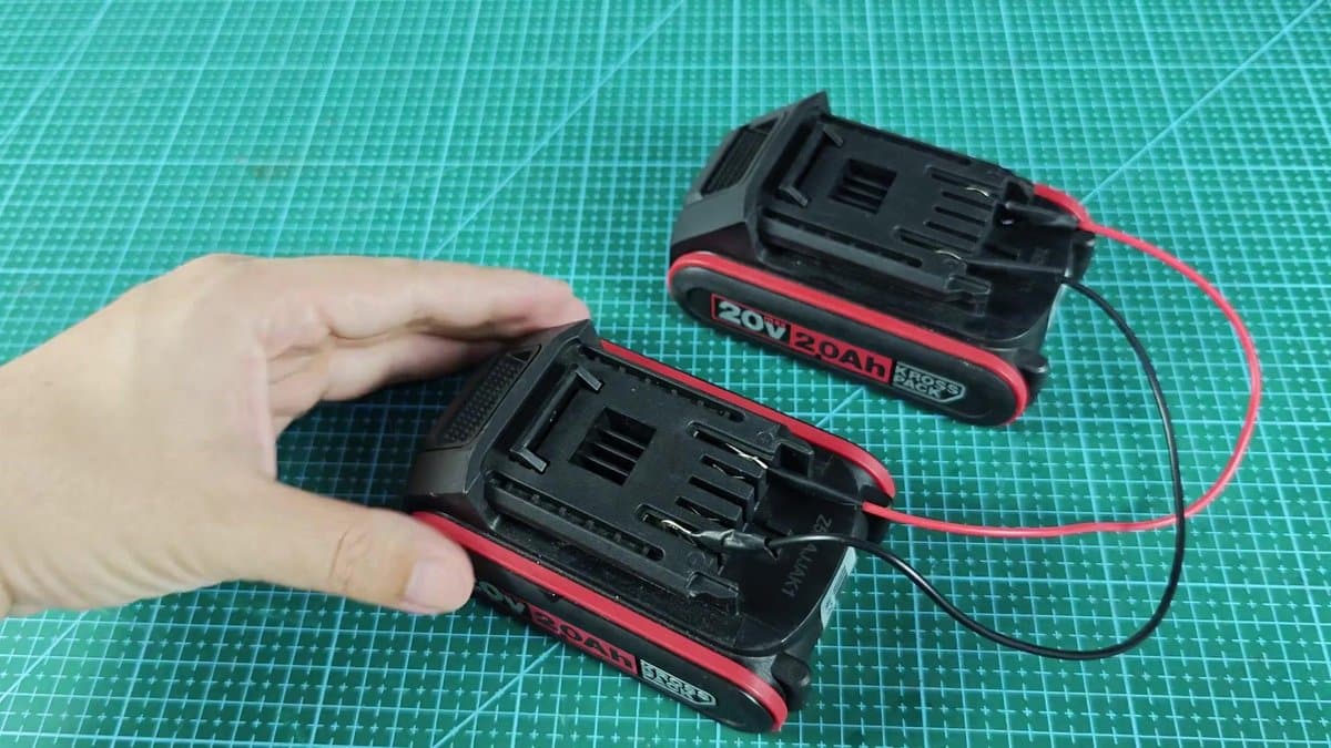 20V battery packs on cutting mat with wires connected