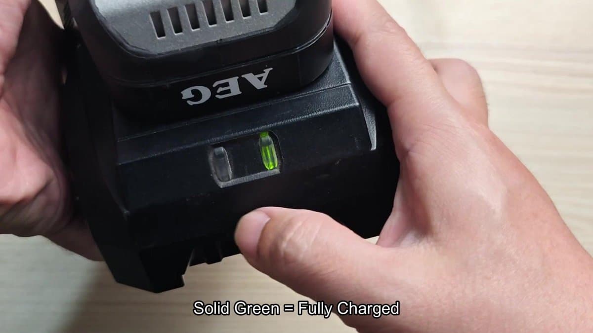 AEG battery charger with solid green light