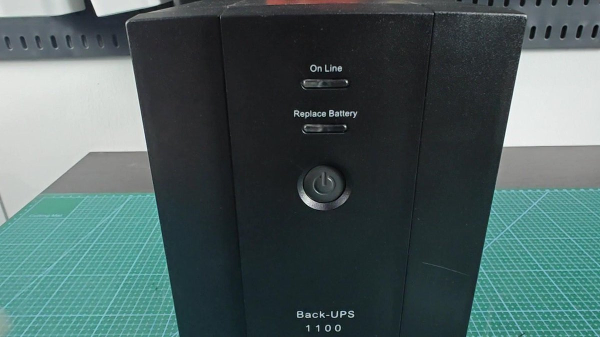 APC Back-UPS 1100 with power button visible