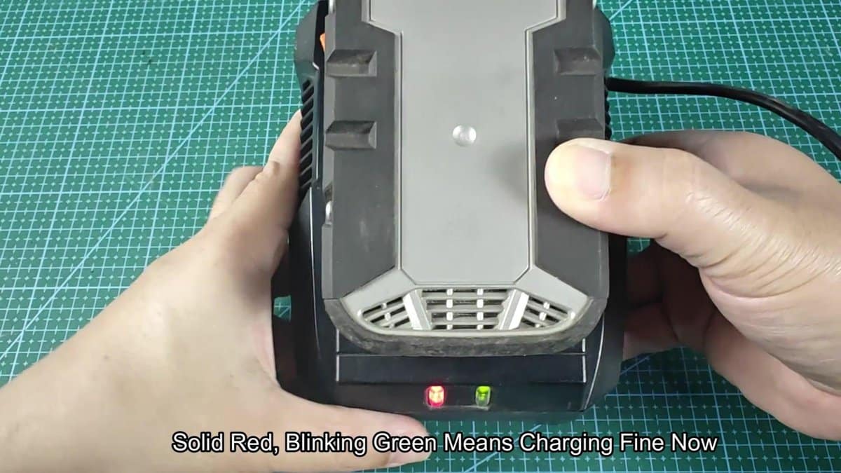 Battery charger with red and green lights blinking