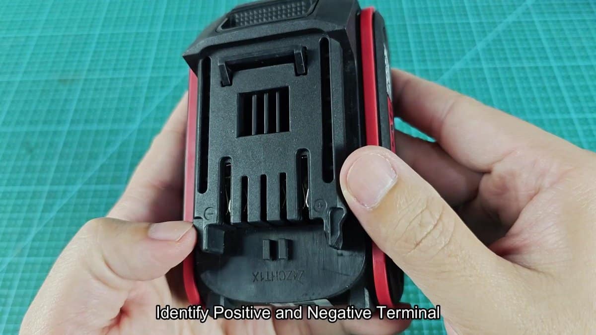 Battery pack showing terminal slots and labels