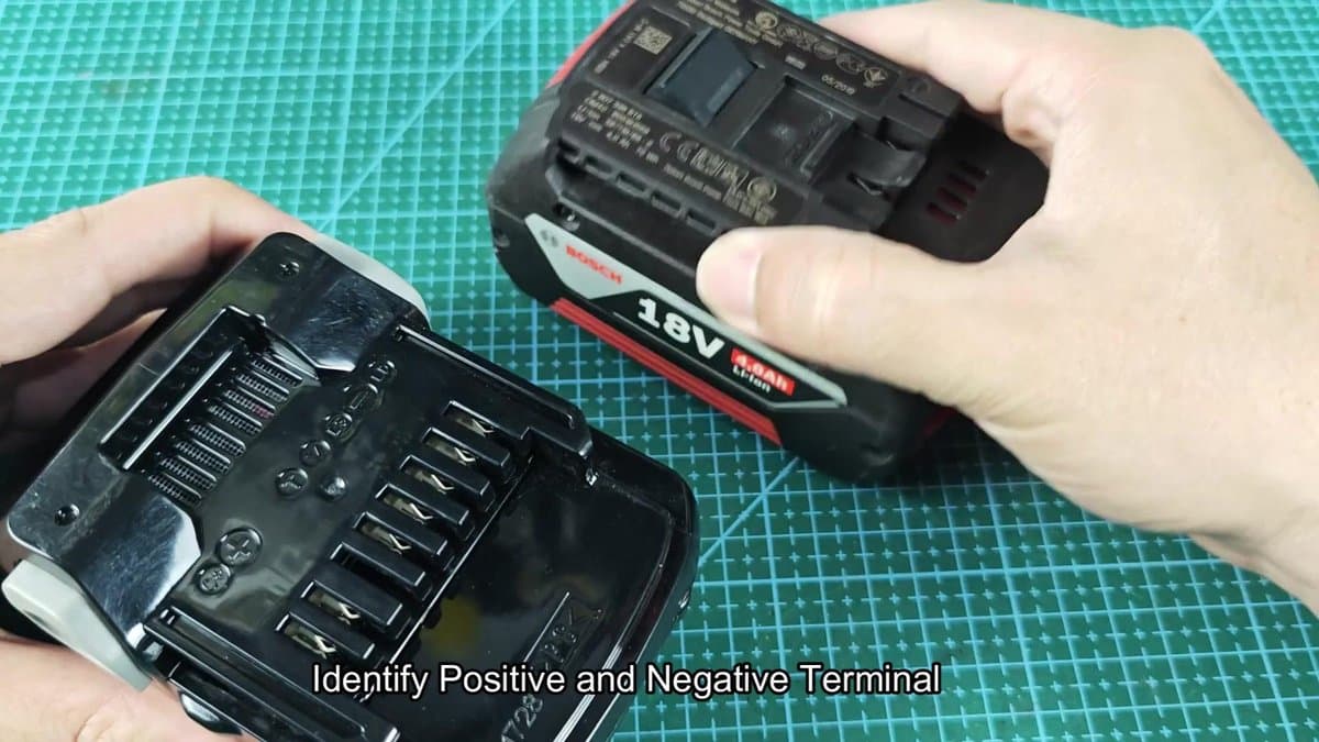 Bosch 18V battery terminals being examined