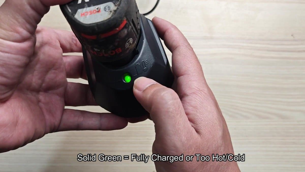 Bosch battery on charger with green light
