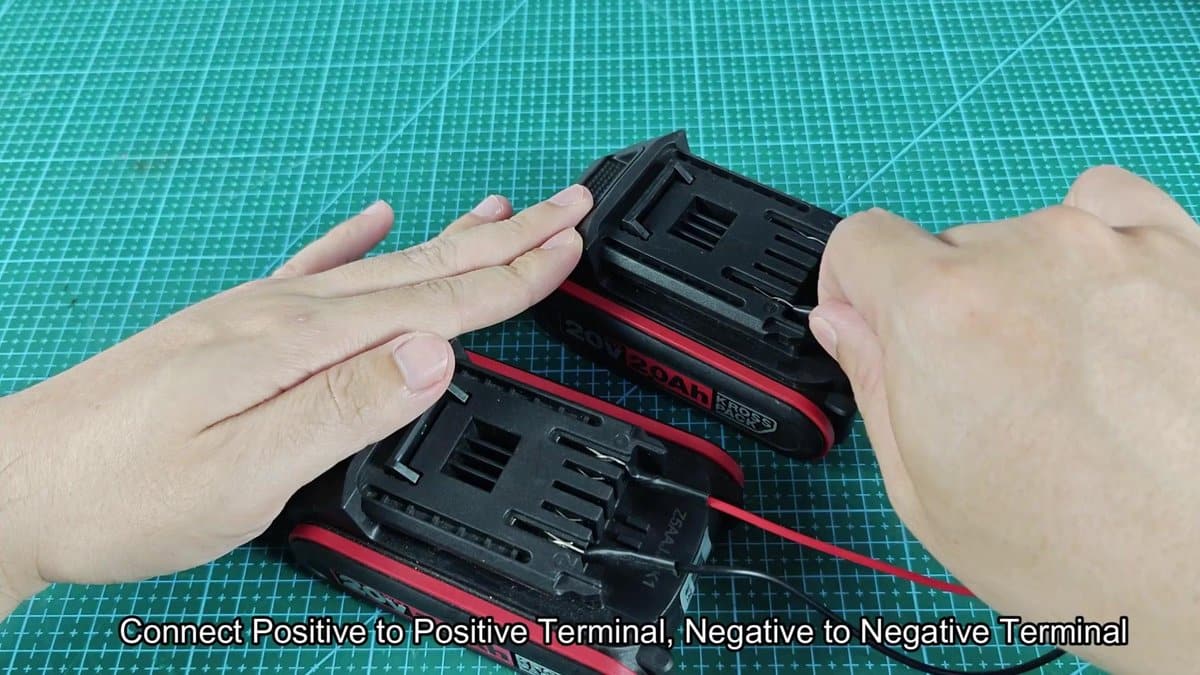 Coss 20V battery connected with red and black wires