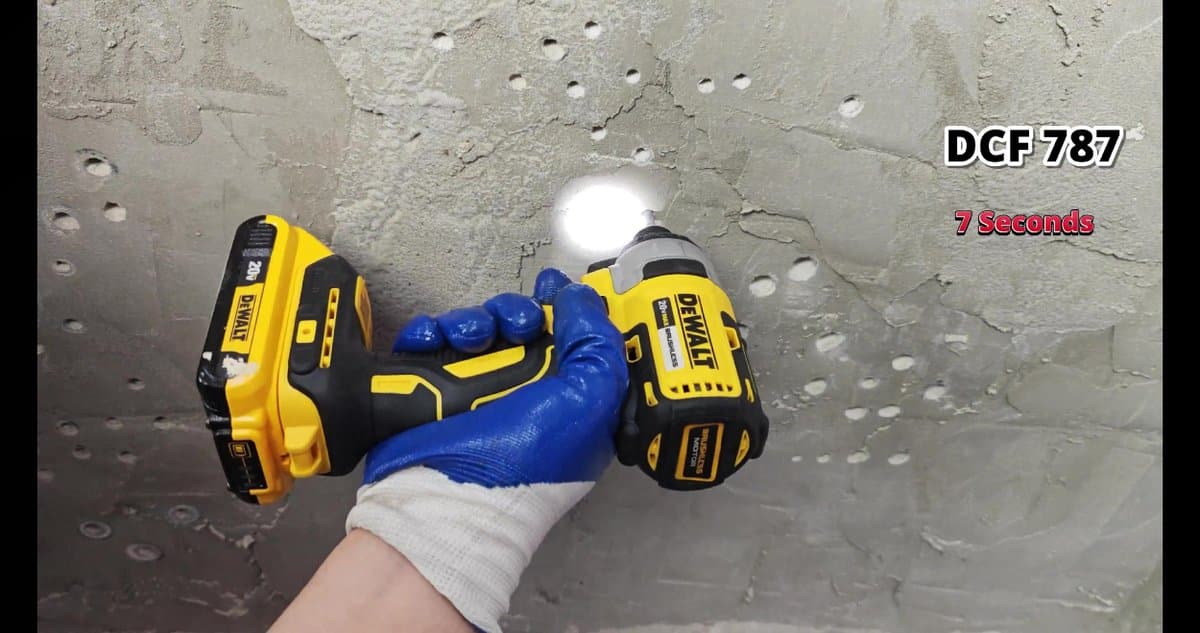 DeWalt drill DCF 787 in use on concrete wall