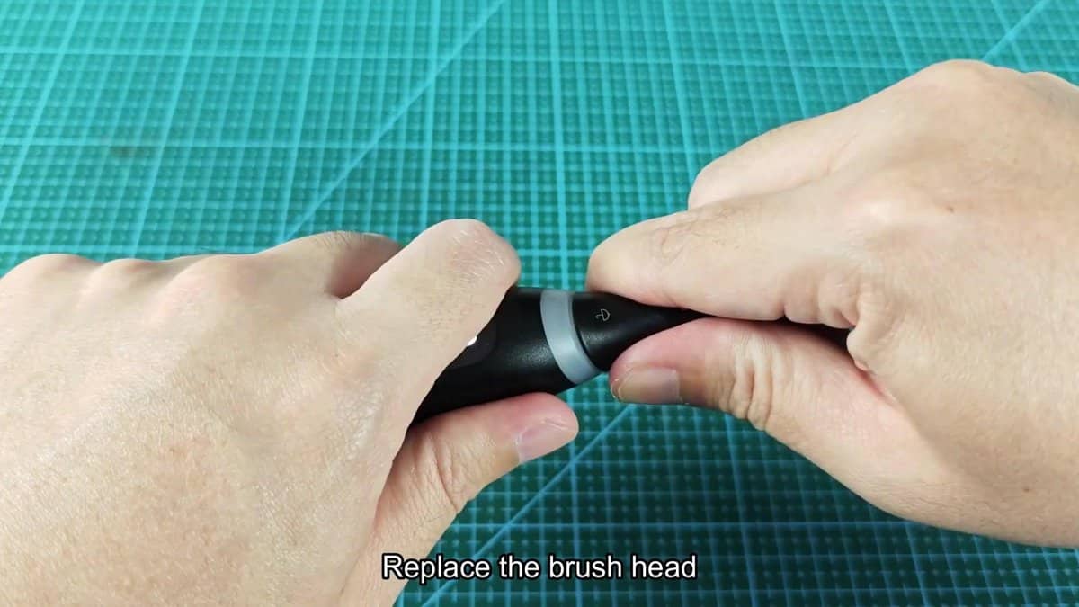 Electric toothbrush head being replaced