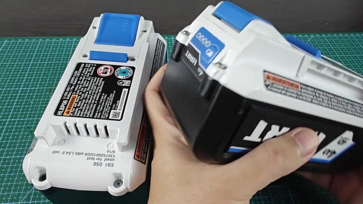 Hart 40V battery being inserted into charger