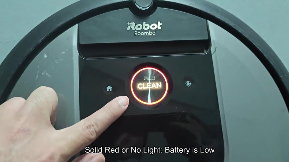 iRobot Roomba with red clean button illuminated