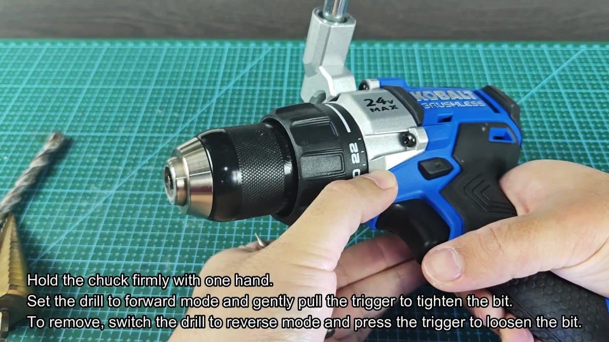 Kobalt 24V drill with chuck being tightened