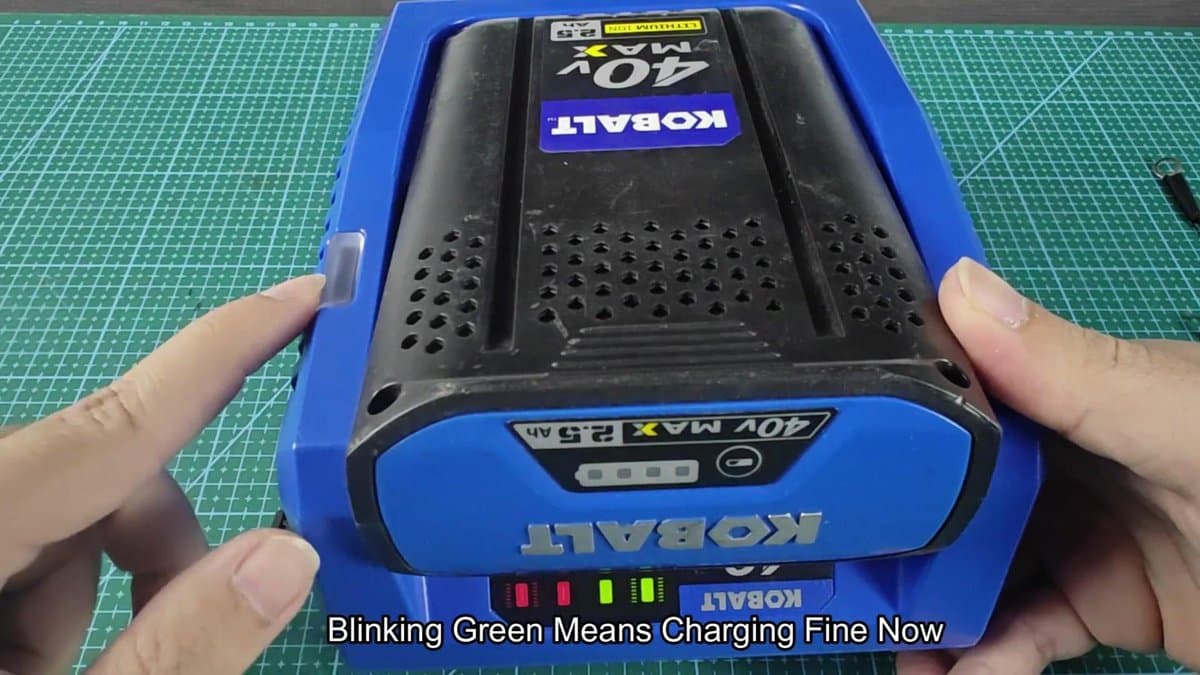 Kobalt 40V battery on charger with green light blinking