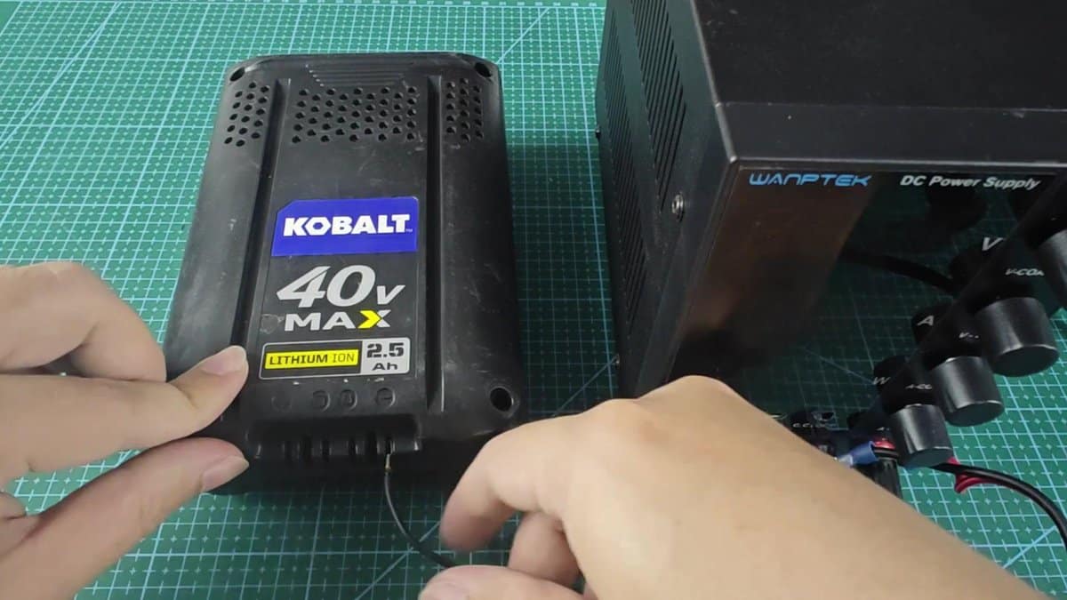 Kobalt 40V Max battery connected to power supply