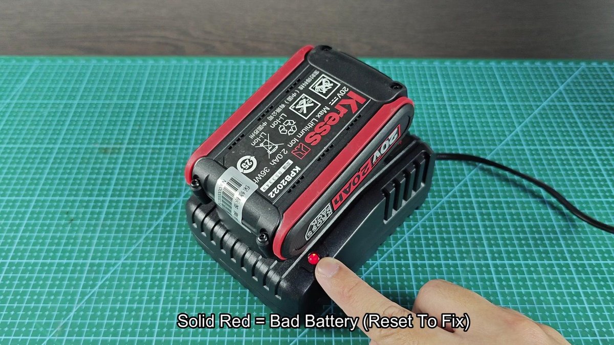 Kress battery charger with solid red light indicator