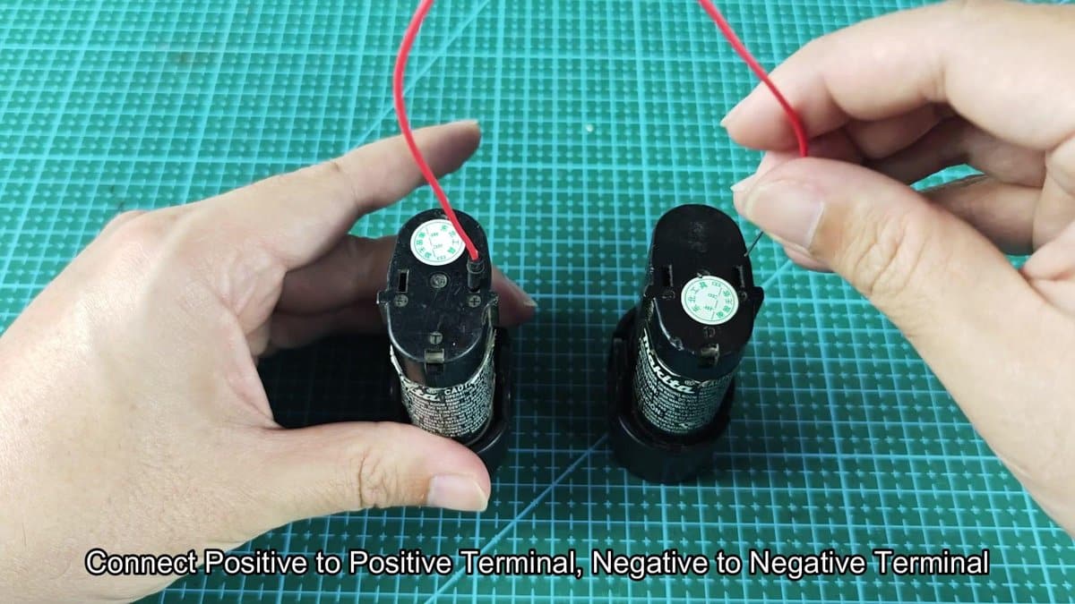 Makita battery terminals with red wire connected