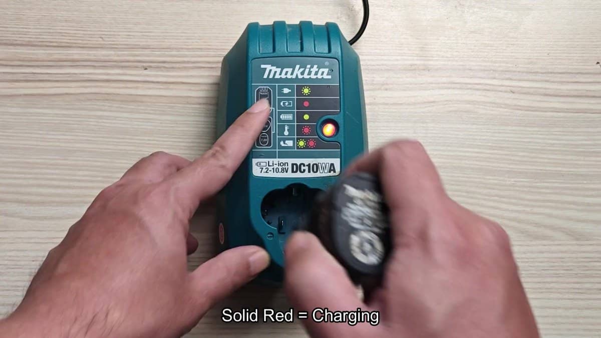 Makita DC10WA charger with solid red light