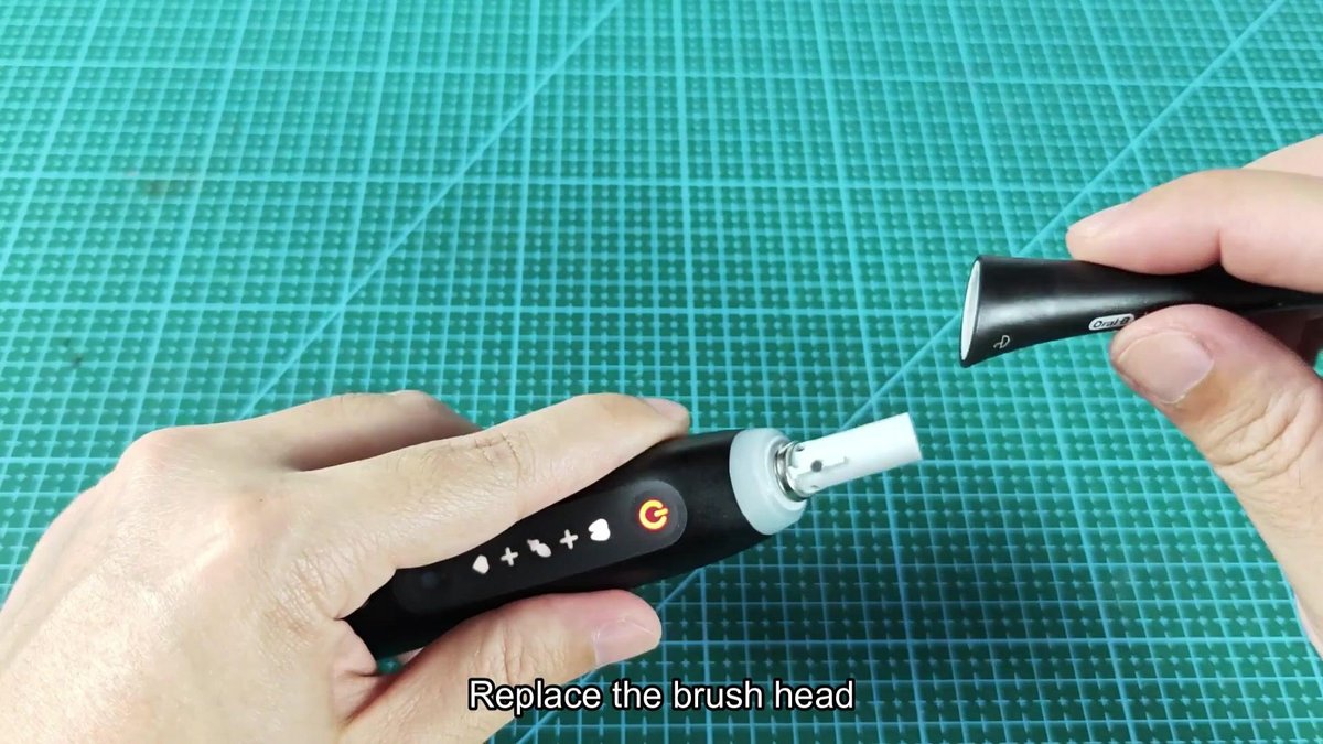 Oral-B toothbrush with brush head being replaced