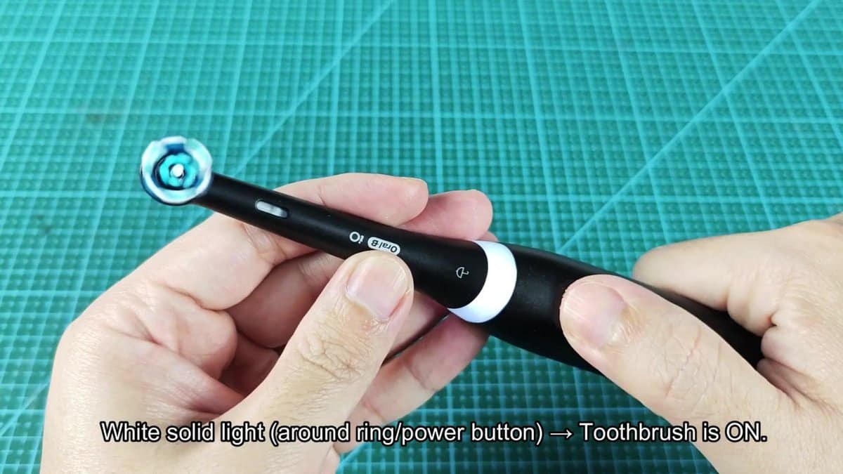Oral-B toothbrush with white power light on