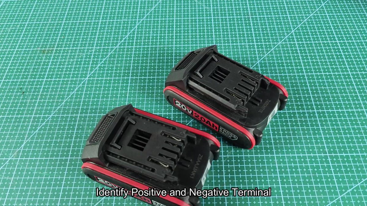 Two 20V battery packs on cutting mat