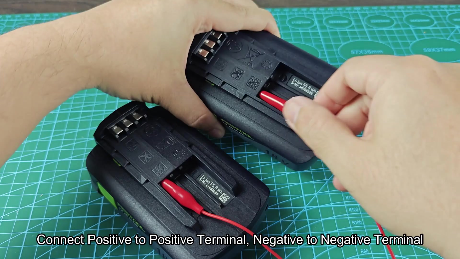Alligator clips linking two 18V battery packs Alligator clips linking two 18V battery packs