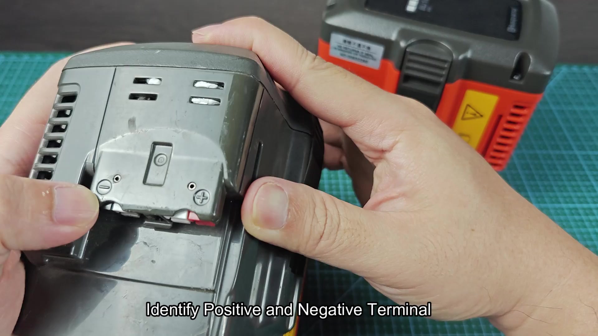 Battery connector terminals exposed and identified Battery connector terminals exposed and identified