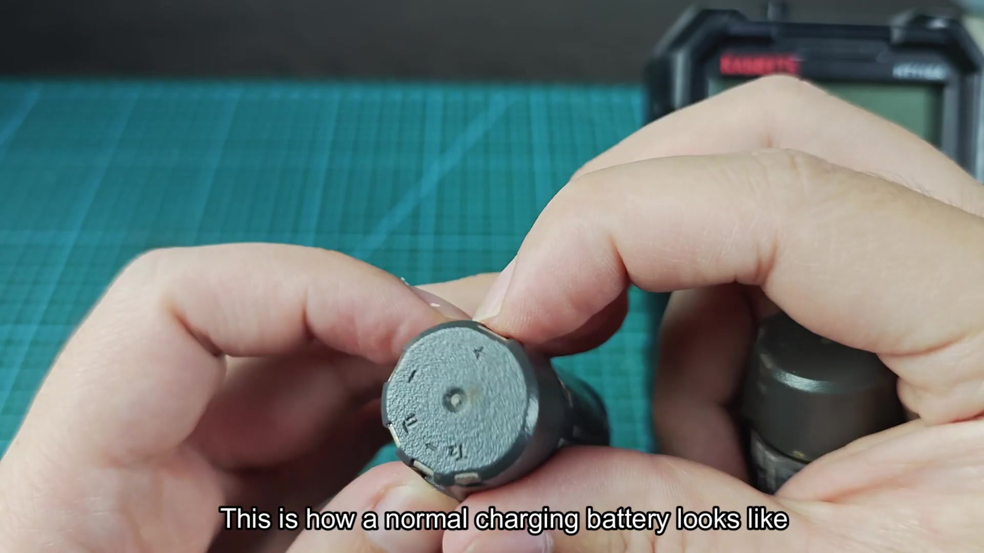 Battery positive and negative terminals identified
