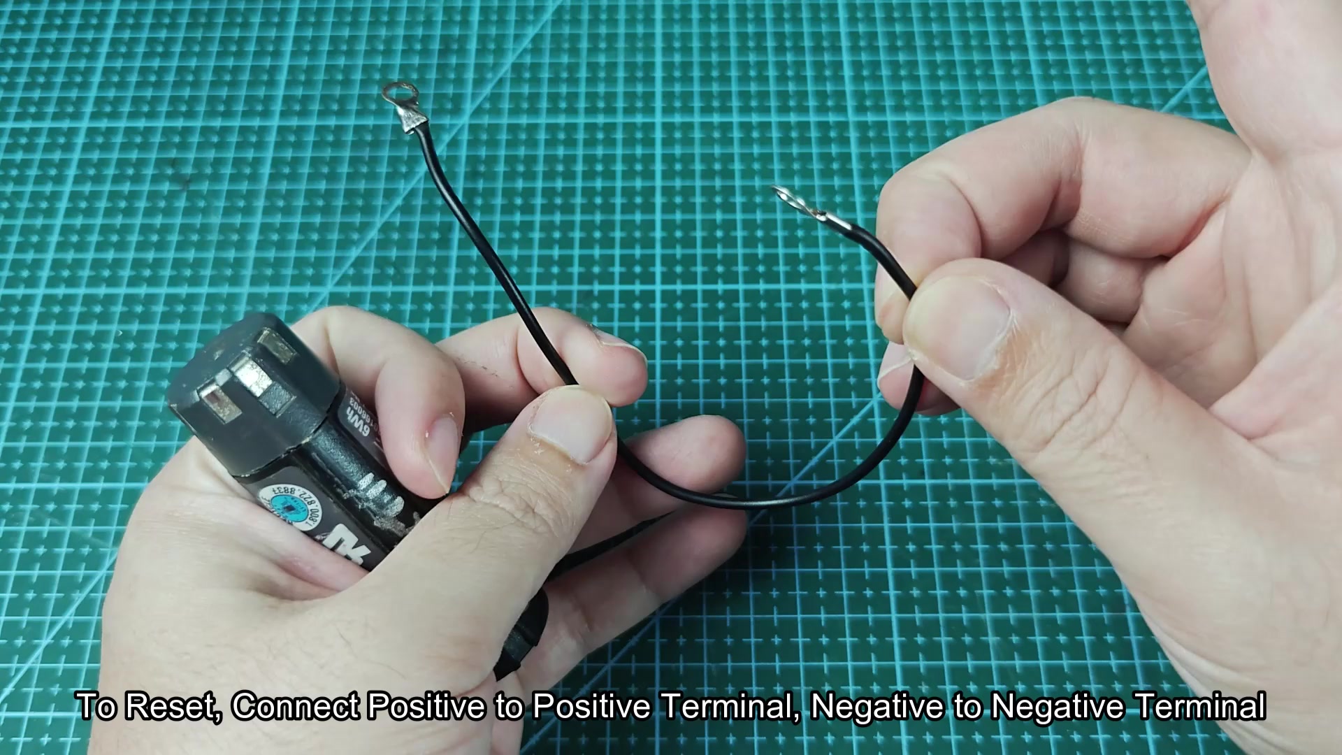 Black wire connecting to battery terminal for reset