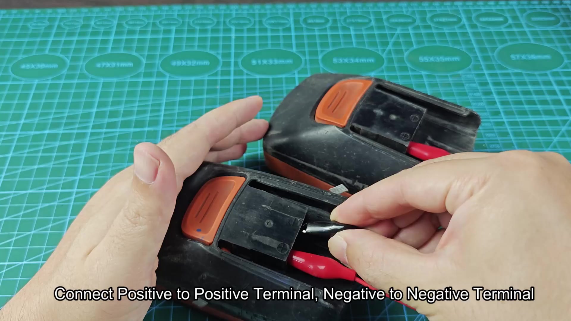 Connecting leads to battery terminals