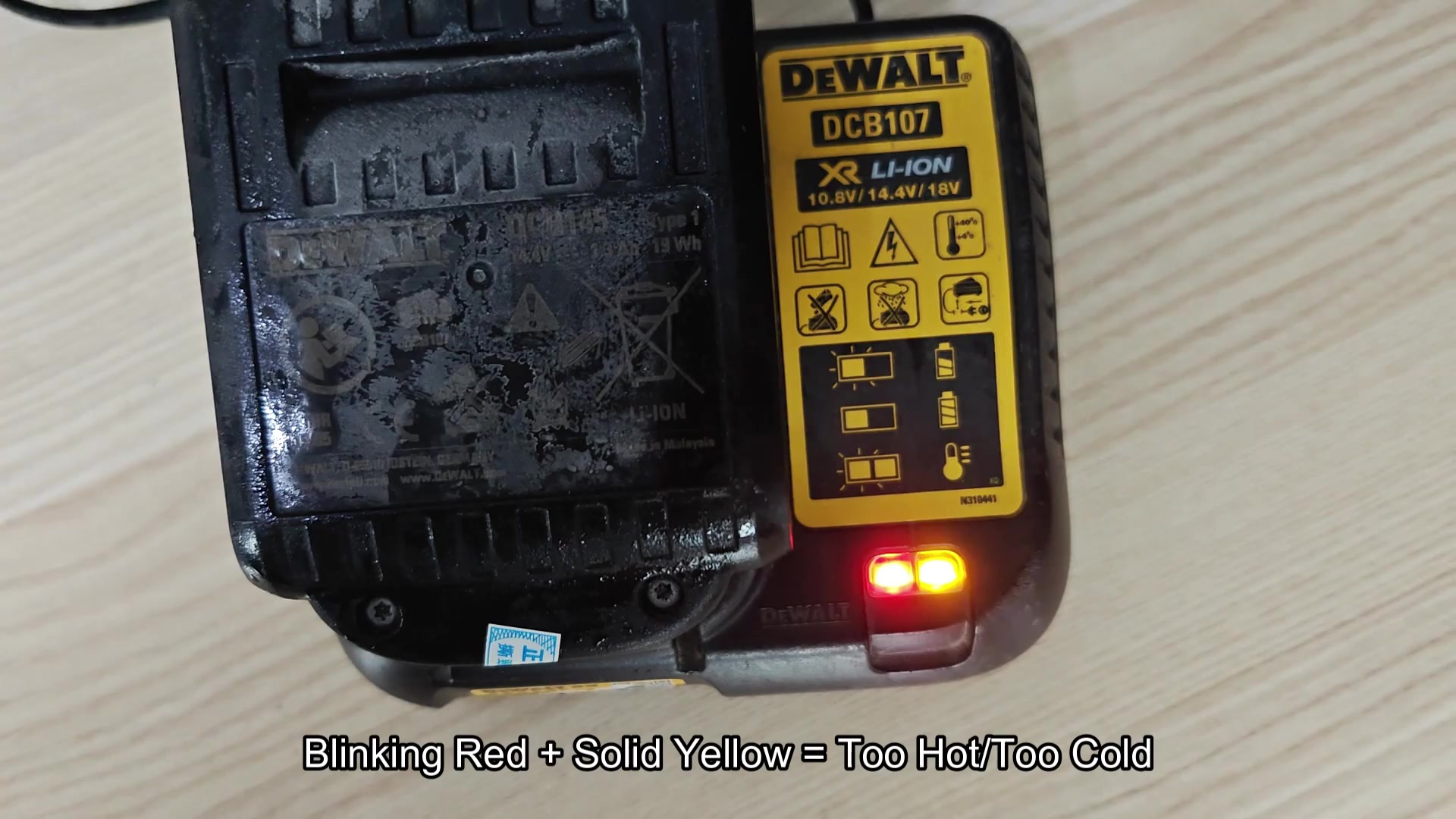 DCB107 blinking red and solid yellow temperature warning
