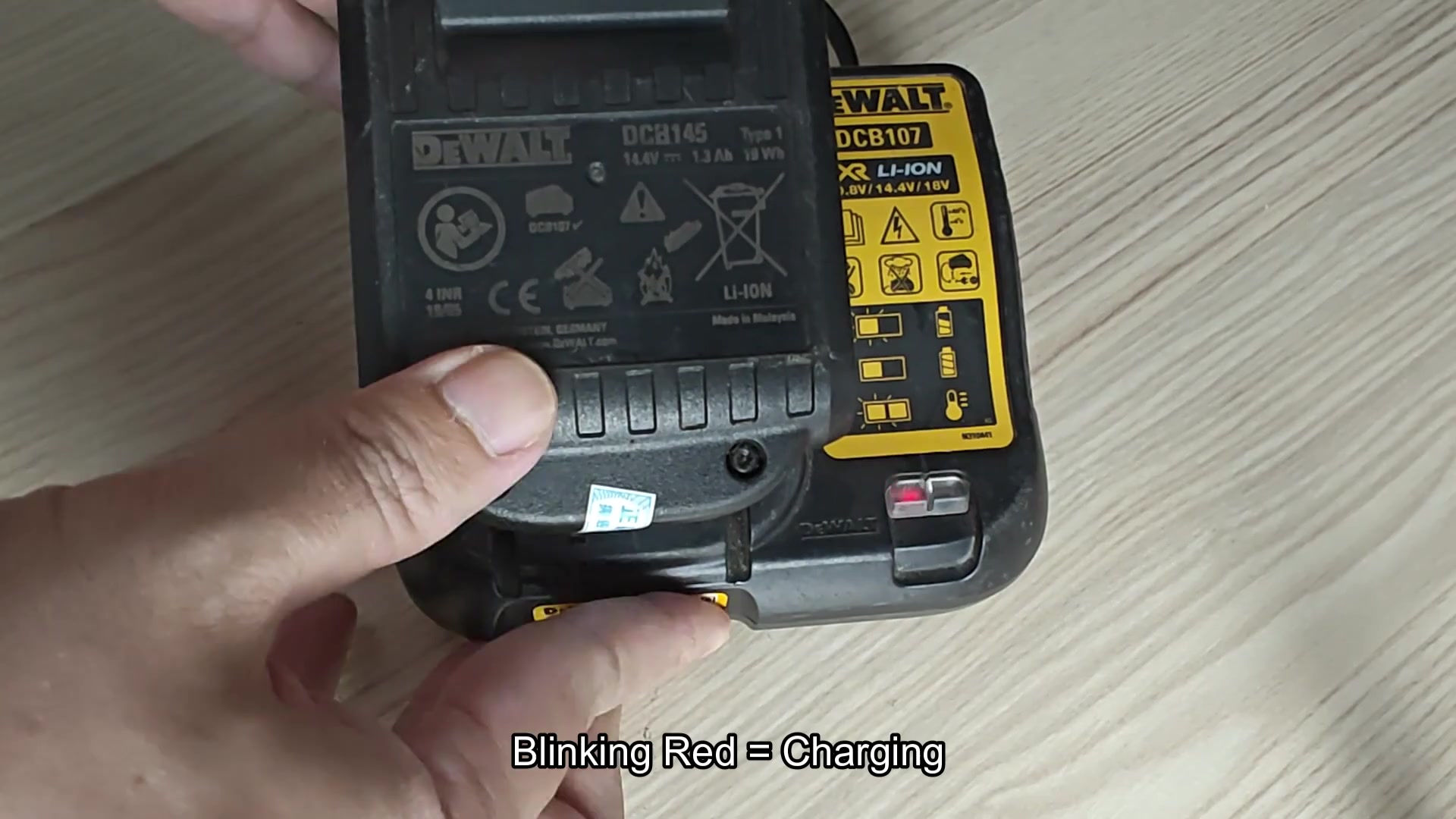 DCB107 blinking red LED means charging
