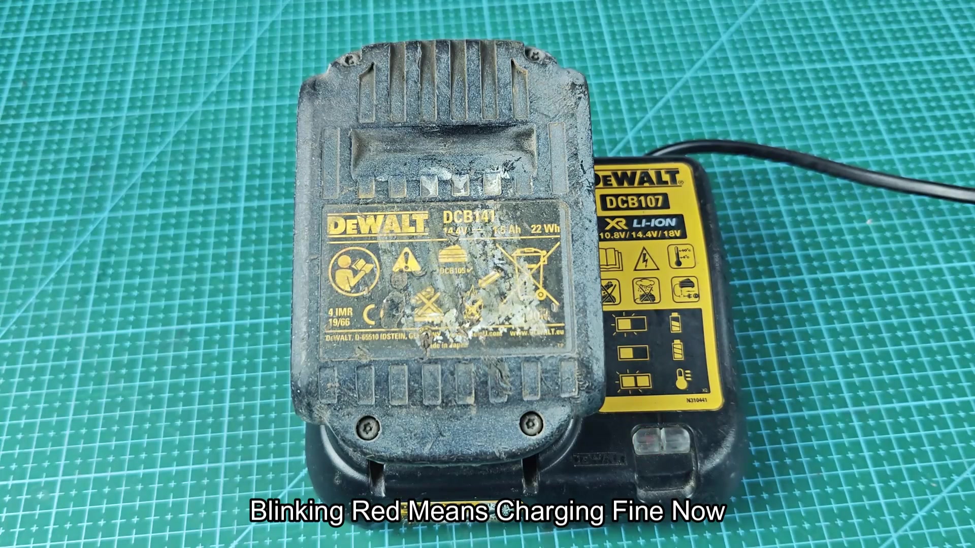 DEWALT battery charging on DCB107 red indicator glowing DEWALT battery charging on DCB107 red indicator glowing