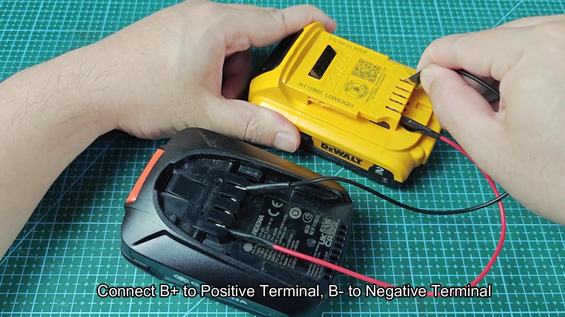 DeWALT battery connected with safety warning displayed
