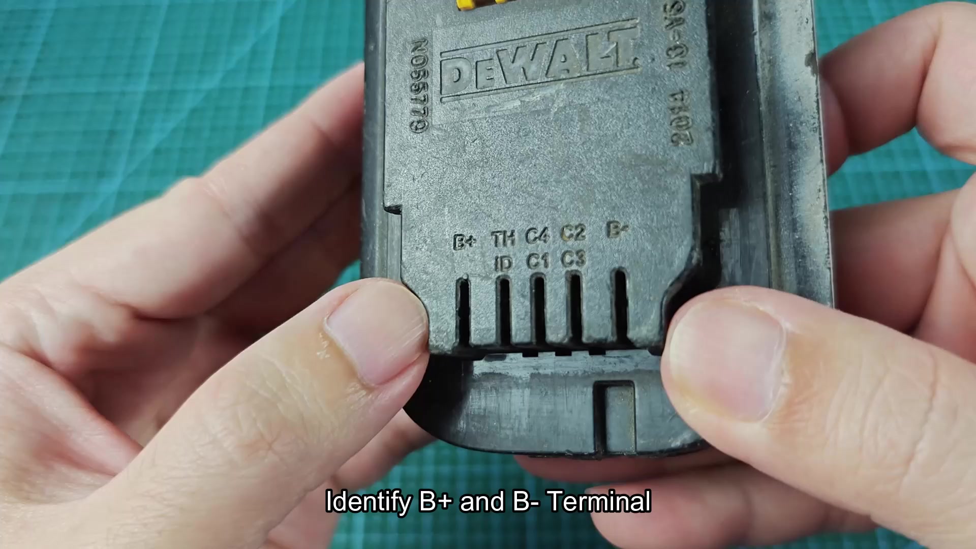 DEWALT battery terminal labels B+ and B- DEWALT battery terminal labels B+ and B-